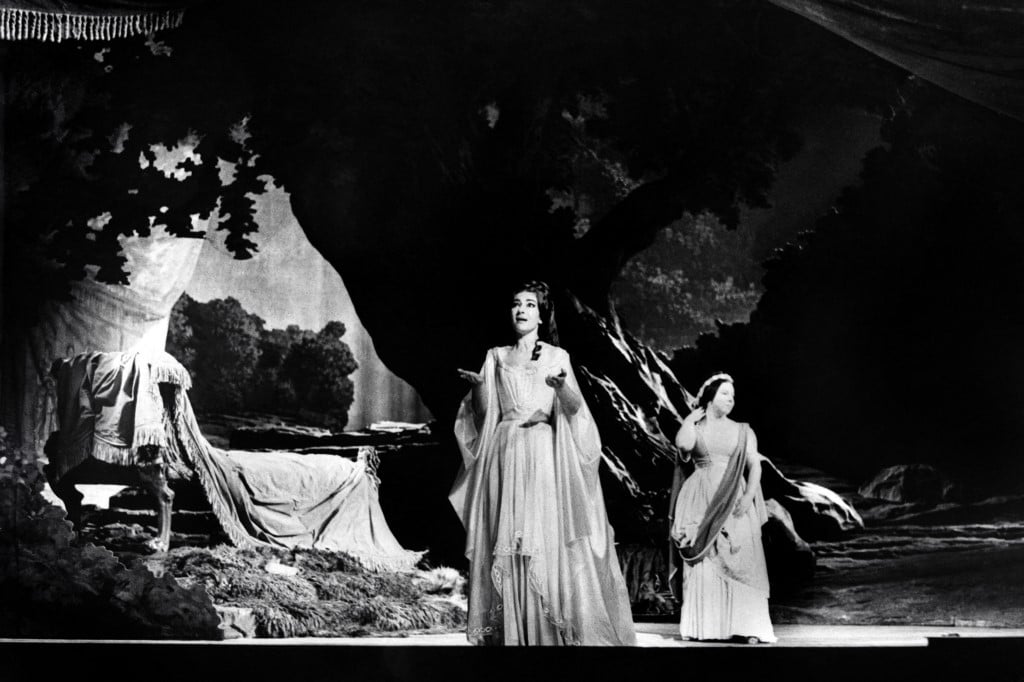 This photograph taken at the Paris Opera House on May 23, 1964, shows American singer of Greek origin Maria Callas (C) and Italian mezzo-soprano Giulietta Simionato (R)  performing in the Bellini opera "Norma". 1Photo by AFP