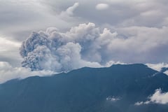 Hikers evacuated as Indonesia volcano spews ash tower