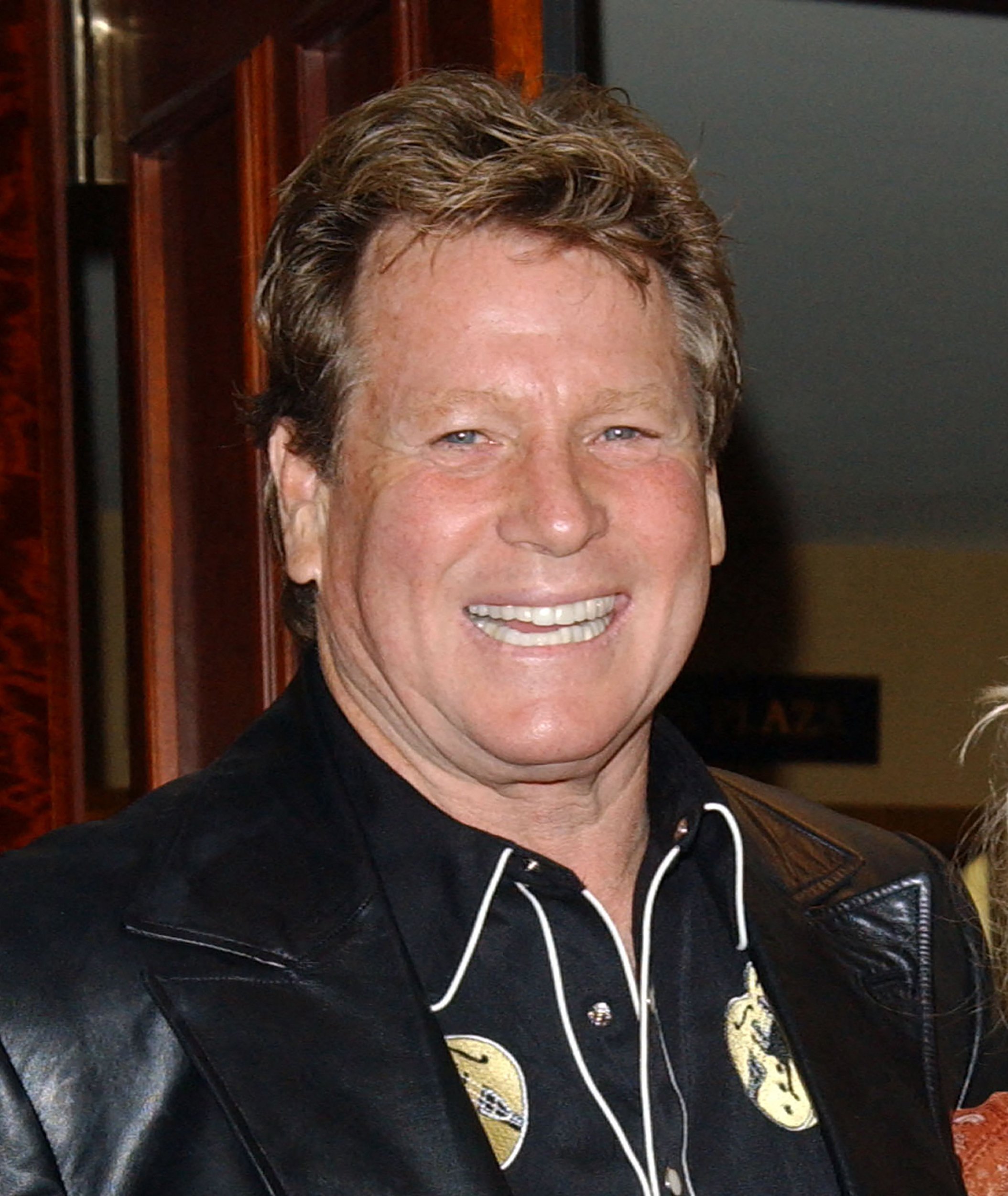 Actor Ryan O'Neal attends the 51st annual Share Boomtown party held at the Century Plaza hotel in Los Angeles on 15 May 2004. Actor and heartthrob Ryan O'Neal, the Oscar-nominated star of films such as "Love Story" and "Barry Lyndon," has died, his son said on 8 December 2023. He was 82. (Photo by Chris DELMAS / AFP)