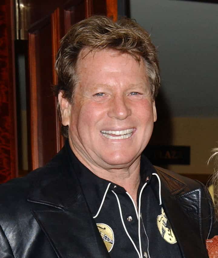Actor Ryan O'Neal attends the 51st annual Share Boomtown party held at the Century Plaza hotel in Los Angeles on 15 May 2004. Actor and heartthrob Ryan O'Neal, the Oscar-nominated star of films such as "Love Story" and "Barry Lyndon," has died, his son said on 8 December 2023. He was 82. (Photo by Chris DELMAS / AFP)