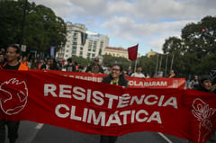 Progress but divides persist as climate summit takes up fossil fuels