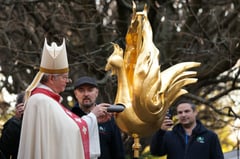 Golden rooster fitted to spire of Paris’ Notre Dame cathedral