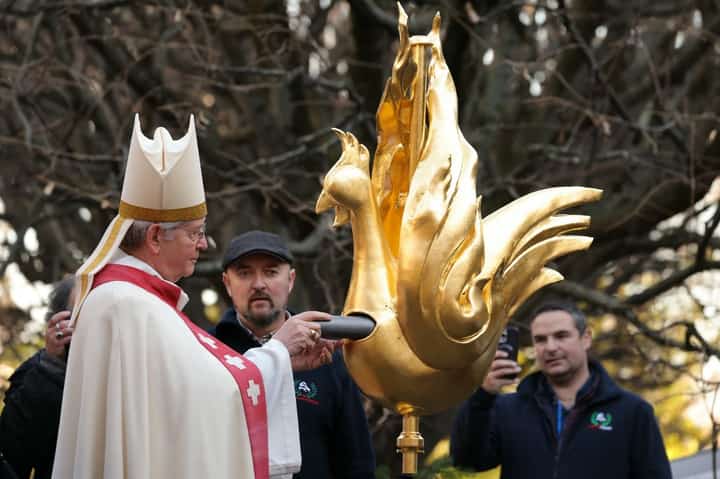 Golden rooster fitted to spire of Paris’ Notre Dame cathedral