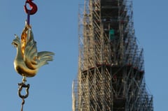 Golden rooster fitted to spire of Paris’s Notre Dame cathedral