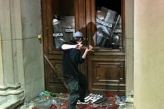 Opposition supporters try to storm Belgrade city hall
