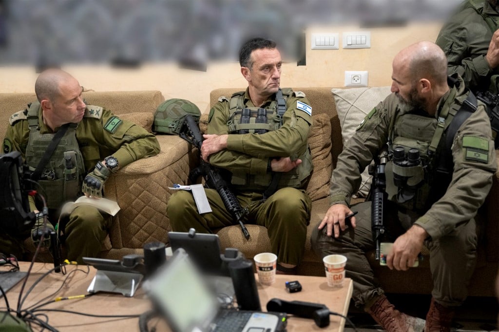 This handout picture released by the Israeli army on December 23, 2023 reportedly shows the Israeli army's Chief of the General Staff Herzi Halevi (C) during a situational assessment with Israeli army soldiers in Khan Yunis with the Head of the Southern Command Major General Yaron Finkelman (L) and the CO of the 98th Brigade Brigadier General Dan Goldfus (R); amid the ongoing conflict between Israel and the Palestinian militant group Hamas in the Gaza Strip. Photo by Israeli Army / AFP