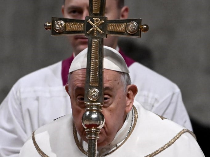 Pope Francis presides the Christmas Eve mass at  St. Peter's Basilica in the Vatican on 24 December 2023. (Photo by Tiziana FABI / AFP)