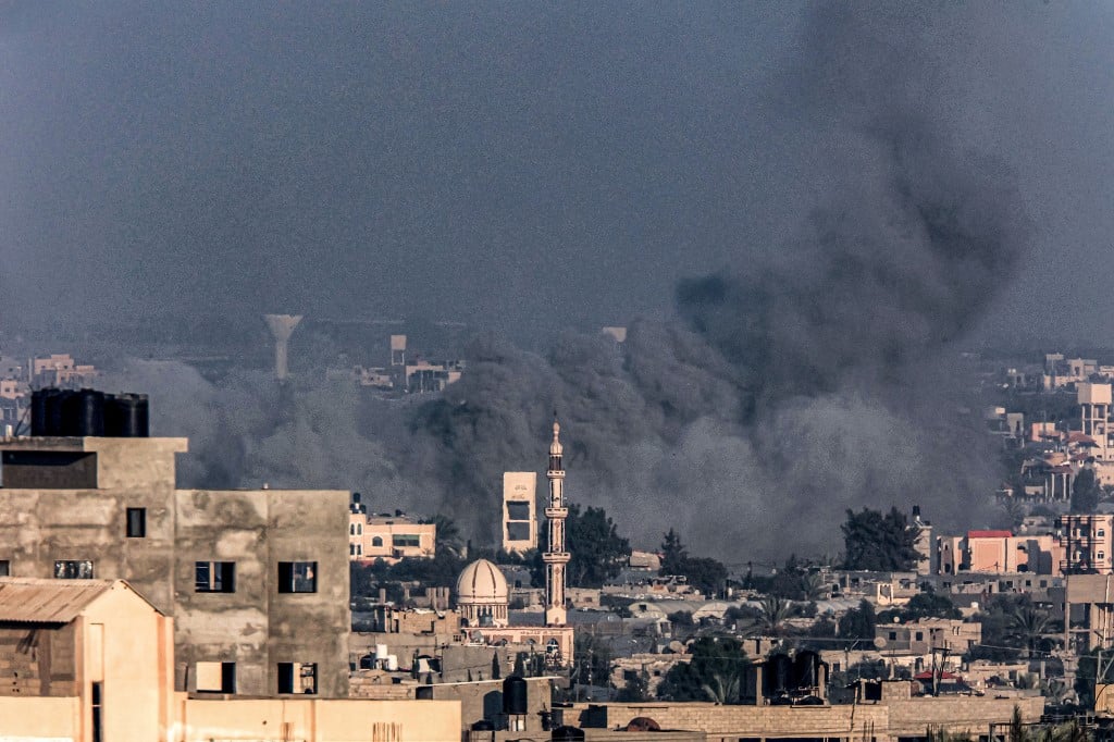 Israel ‘intensifying’ Gaza fighting as Hamas says strikes kill dozens