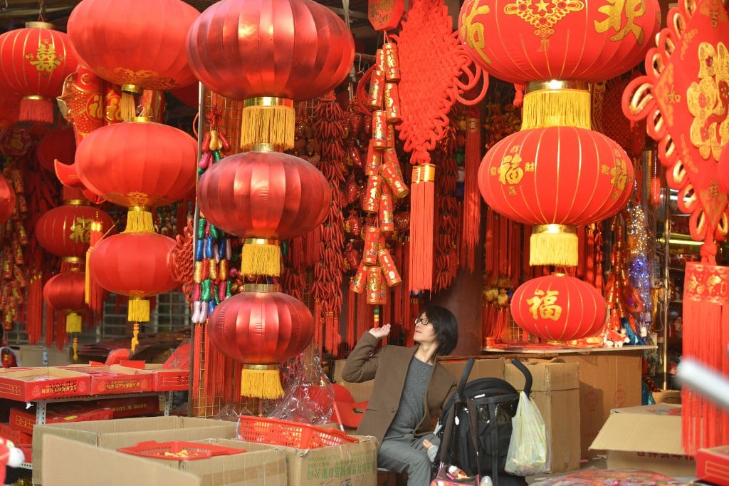 FILE PHOTO: Chinese lanterns are seen on sale at a Chinese New Year street fair on the eve of the holiday in Shanghai. (Photo by PETER PARKS / AFP)