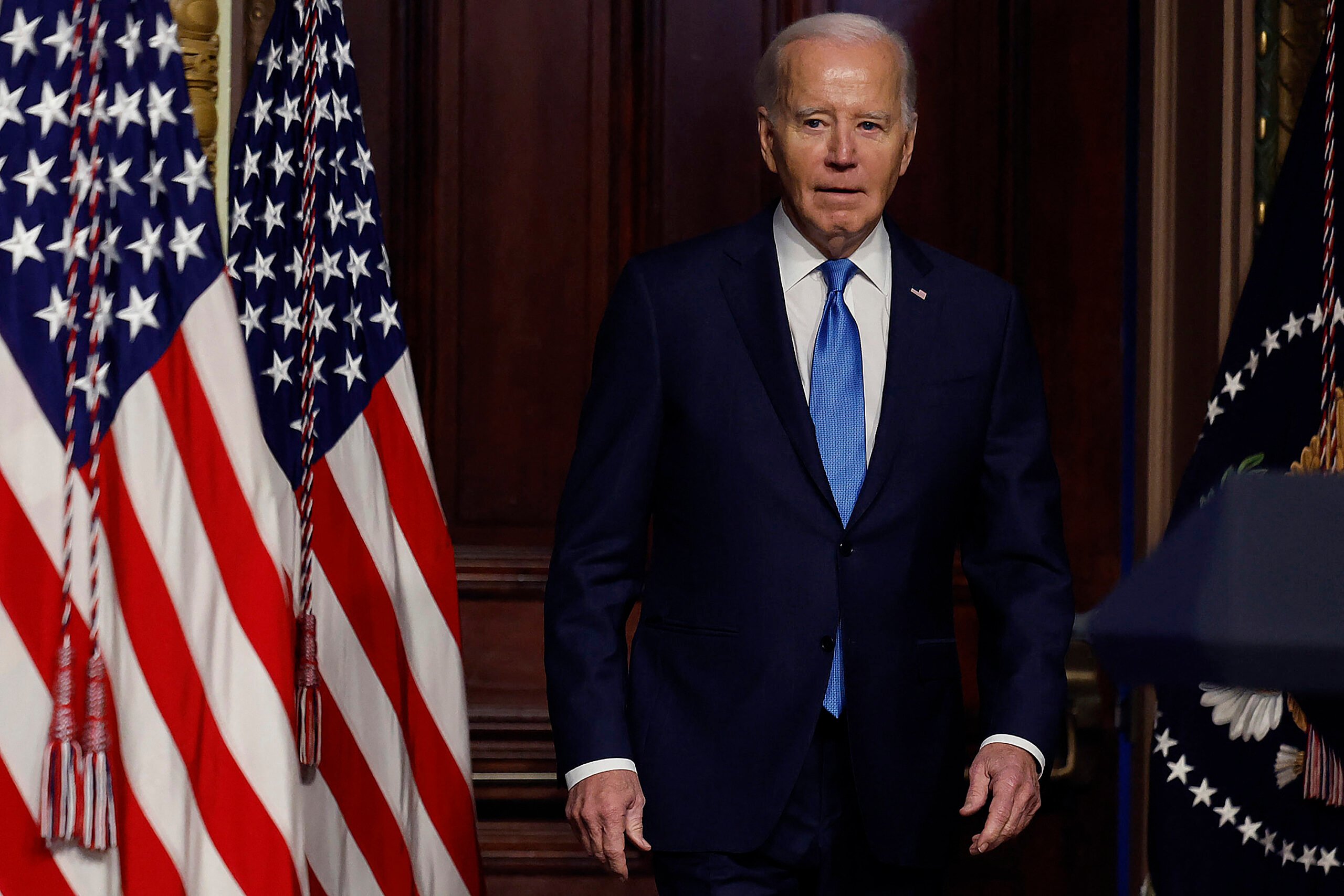 (FILES) U.S. President Joe Biden arrives for a meeting of his National Infrastructure Advisory Council in the Indian Treaty Room of the Eisenhower Executive Office Building on 13 December 2023 in Washington, DC.