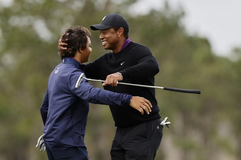 Tiger makes pro-am walk ahead of title hunt with son Charlie