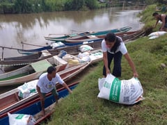 Farmer crosses river to get RCEF stocks