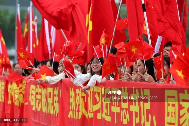 China’s Xi visits Vietnam in bid to counter US