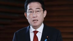 Japan approves record $56-B defense budget