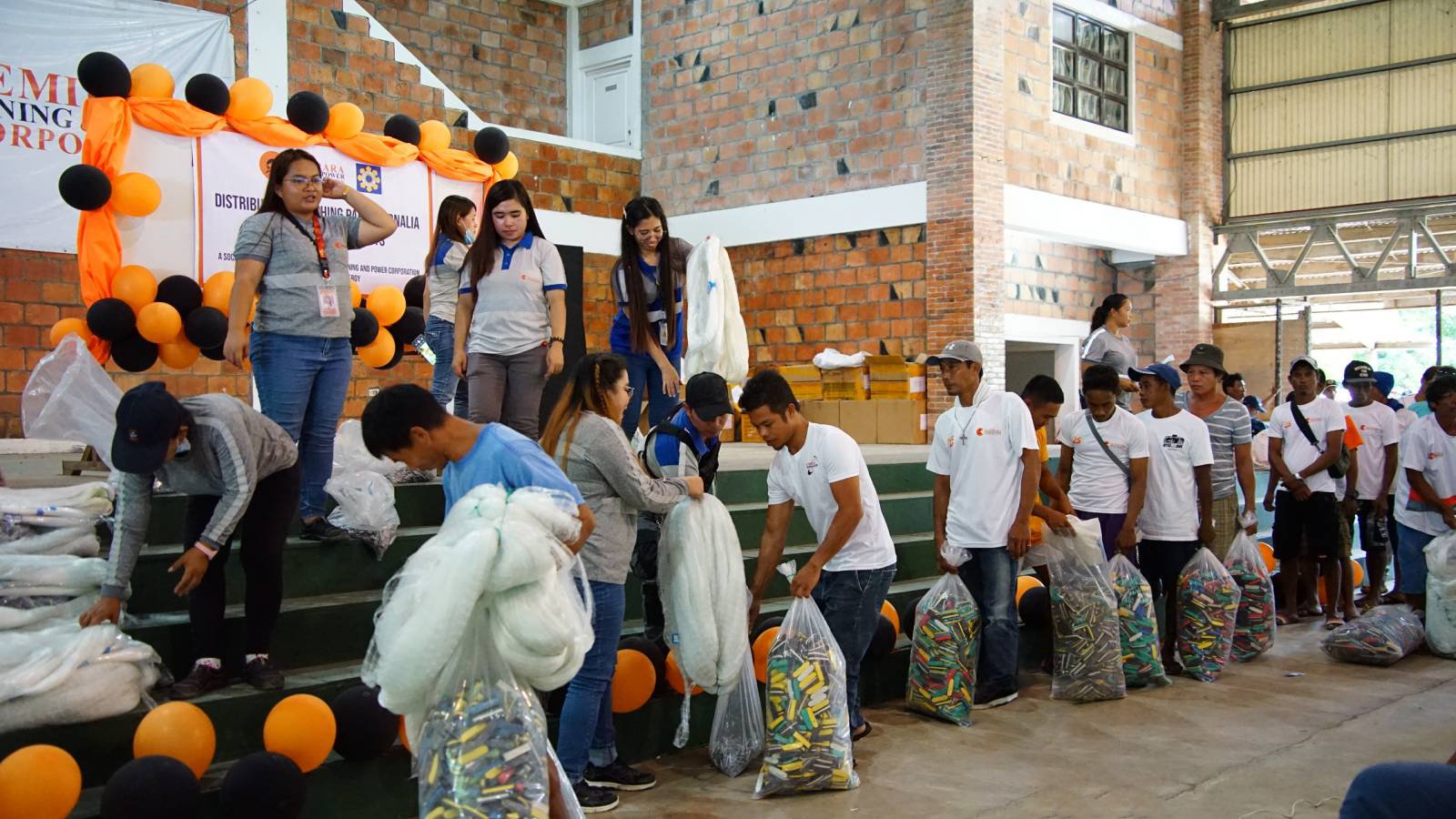 75 fisherfolks receive fishing supplies, solar kits from SMPC