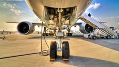 Man found in plane landing gear barely alive