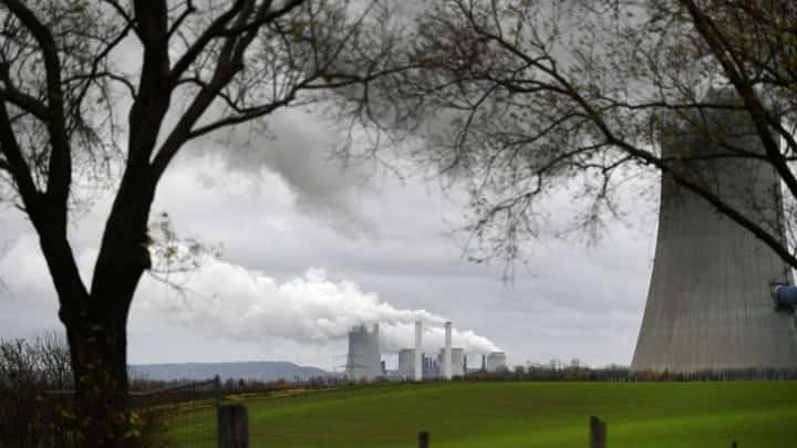 FILE PHOTO: The picture shows the coal-fired power station of German energy giant RWE in Neurath, western Germany, 28 November 2019. (Photo by Ina FASSBENDER / AFP)
