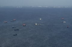 China, US announce military patrols in disputed South China Sea
