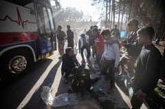 Bombs kill 103 at Iran memorial for slain general: state media