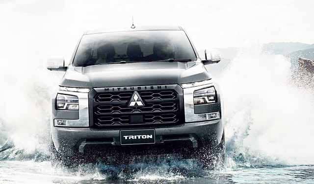 THE All-New Triton's façade evolved into a tough form based on a powerful, three-dimensional front grille and fenders.