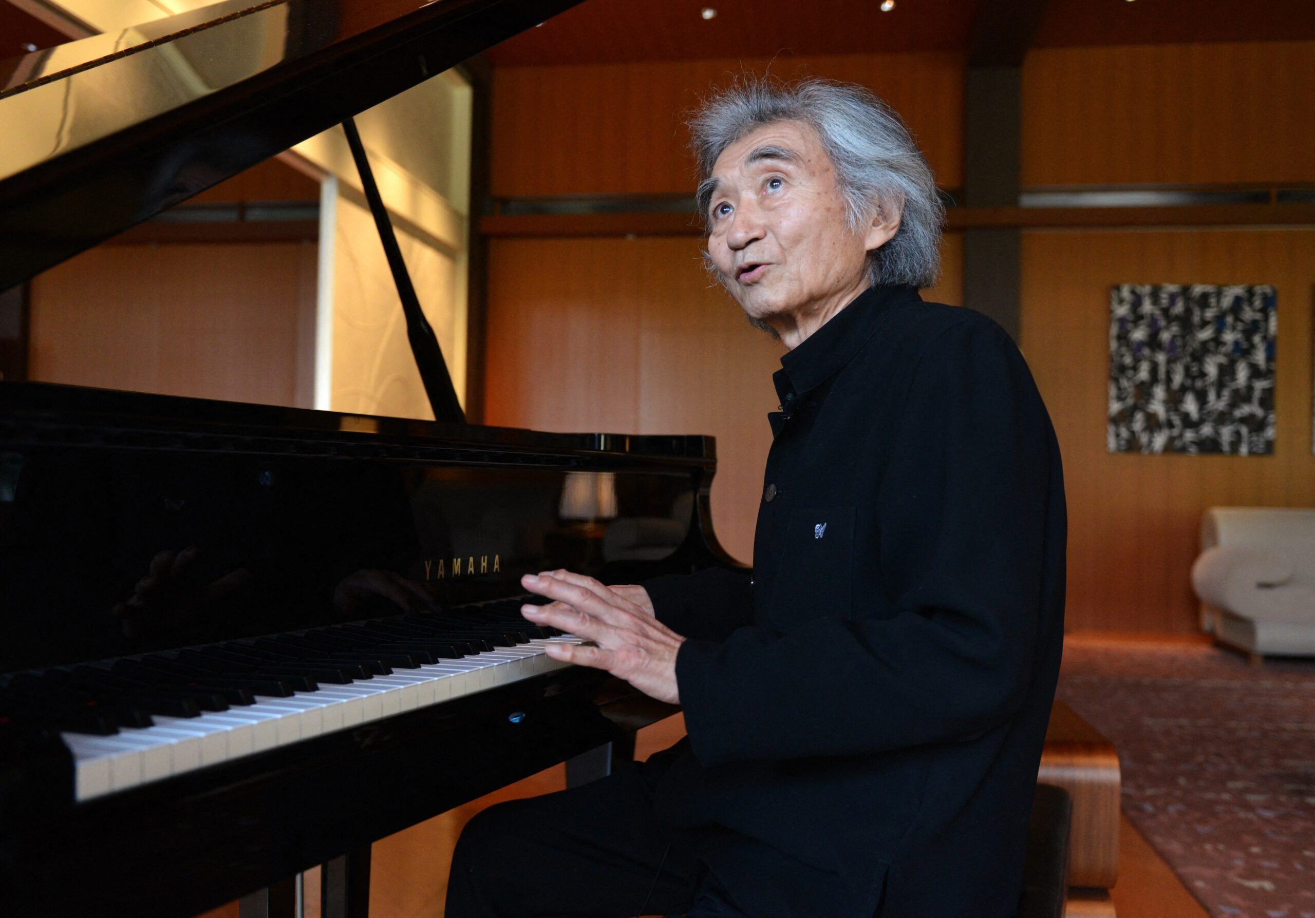 TO GO WITH Entertainment-music-Japan-Ozawa, INTERVIEW by Harumi Ozawa
This photo taken on 8 April 2013 shows Japanese maestro Seiji Ozawa speaking to AFP during an interview at the French ambassador's official residence in Tokyo. At 77-years-old and after beating that cancer, many people might consider slowing down. But far from a rallentando into retirement, Ozawa is keen to get back up to speed and cannot wait to pick up the baton again.        (Photo by YOSHIKAZU TSUNO / AFP)