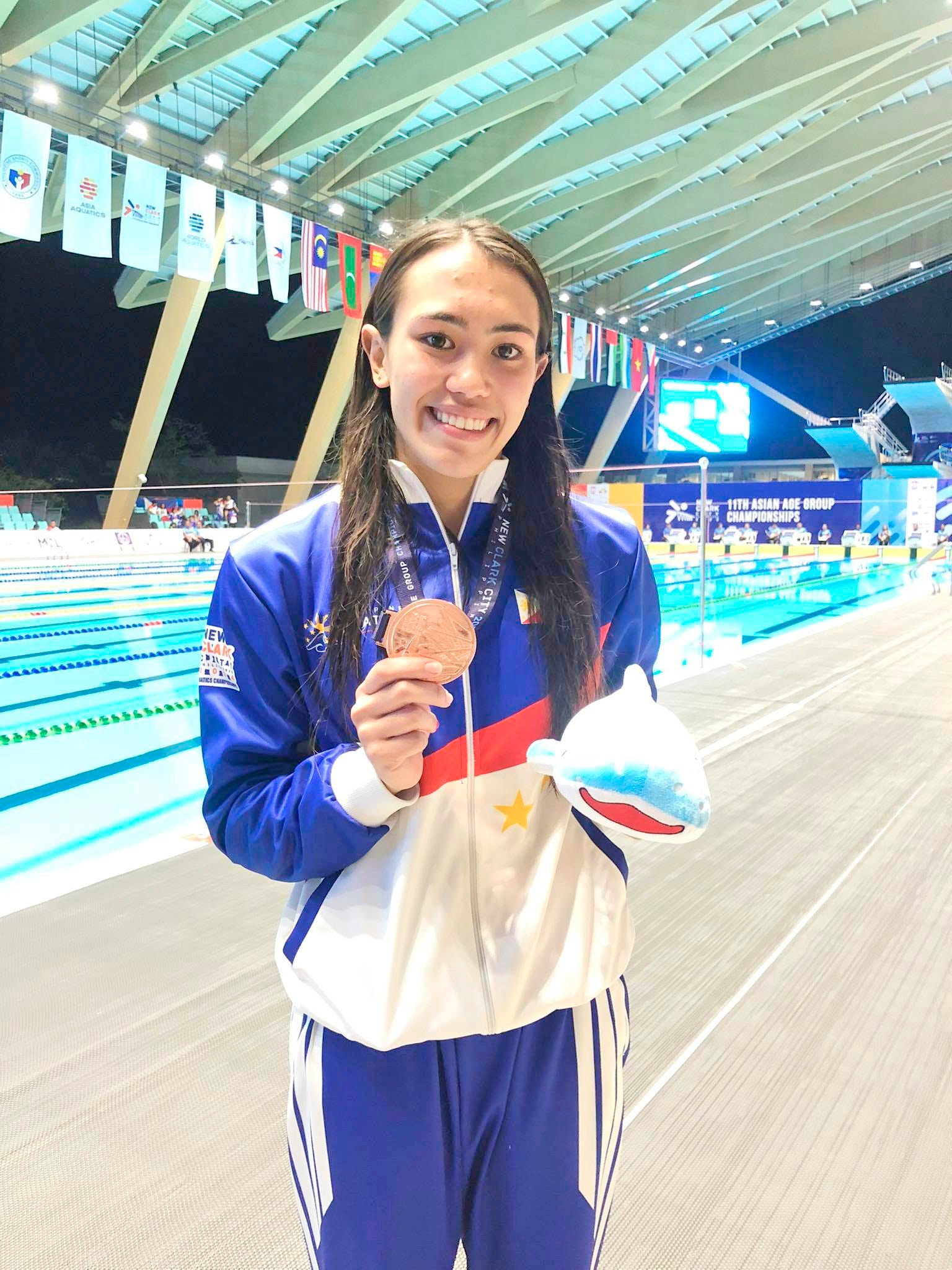 White, Ajido bag bronze medals