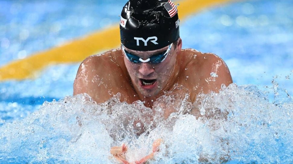 Fink wins 100m breaststroke title