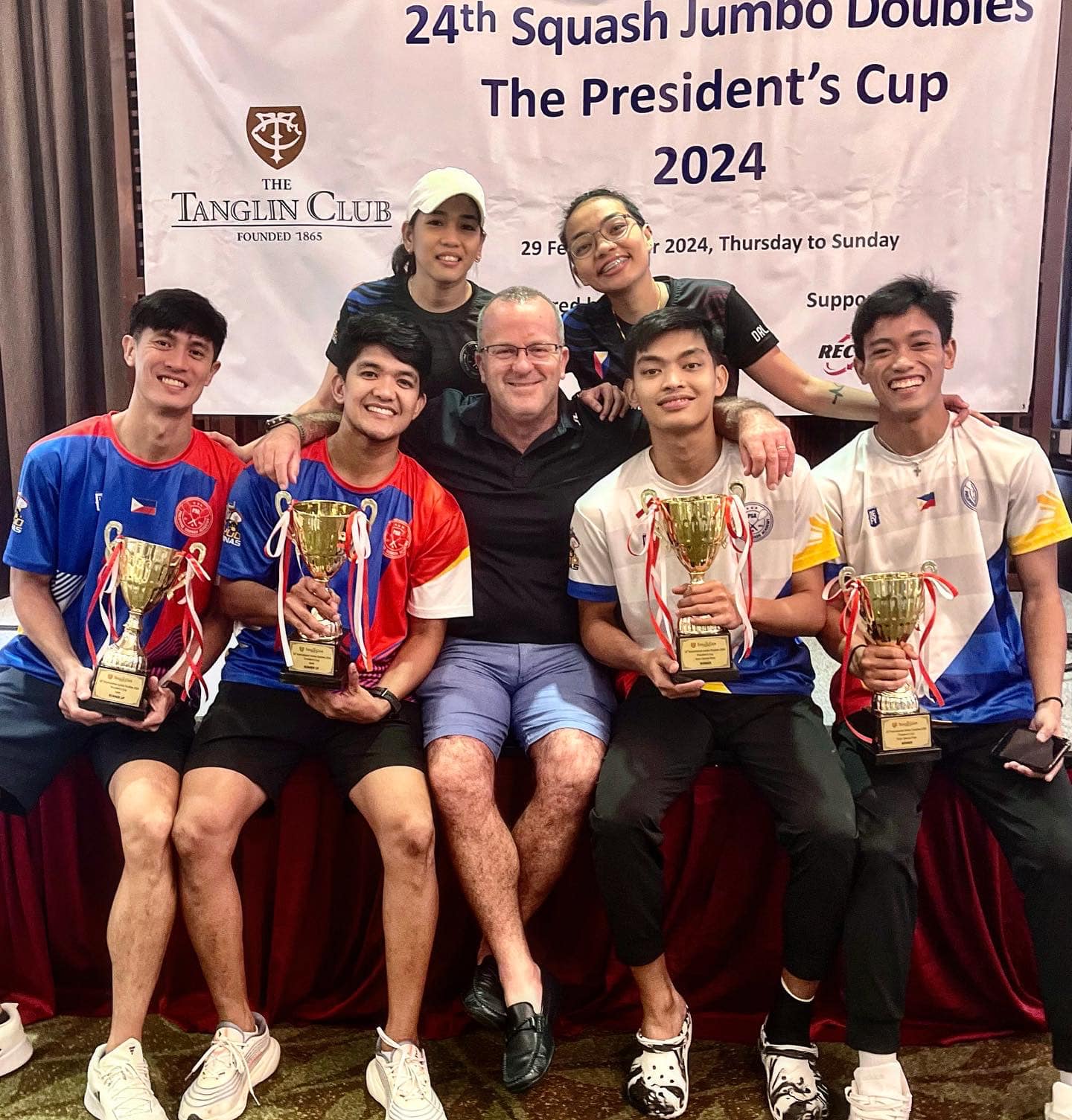 Reymark Perez Begornia and David William Peliño (left) and Van-Aero Dalida and  Mel John Arebado (right) delivered podium finishes in the 24th International Jumbo Doubles Squash Tournament 2024 for the President's Cup at the Tanglin Club in Singapore. | Photograph courtesy of Philippine Squash Academy/FB