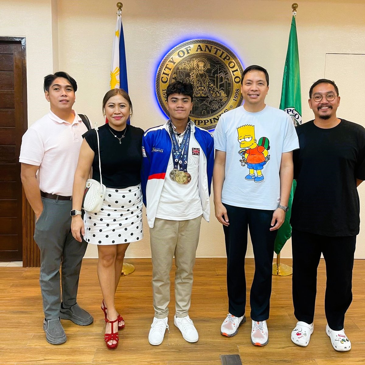 Young swimmer draws support