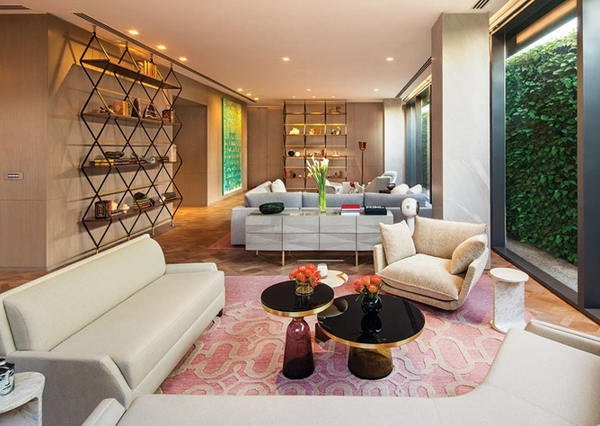 A Yabu Pushelberg-designed living room of a Four Seasons Private Residences sample apartment