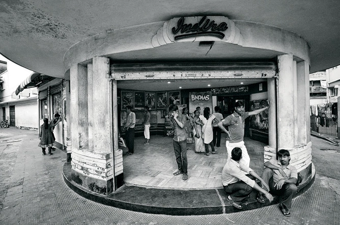 In the 2000s, commercial films—often with non-Bengali titles—gained popularity unmatched in the past two decades. (In this picture, people wait at Kolkata’s Indira cinema before a show of SVF’s Bindaas, released in July 2014.)