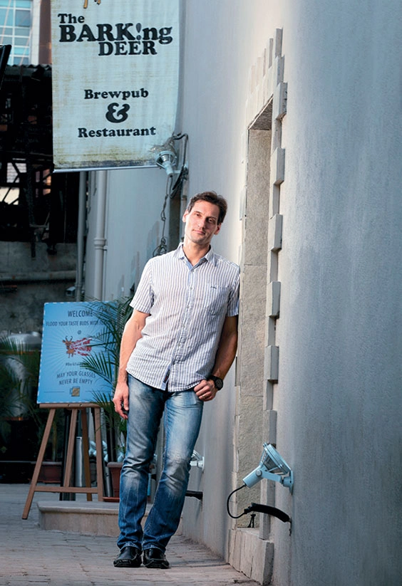 Gregory Kroitzsh, managing partner, Seven Islands Craft Brewery, which owns The Barking Deer brewpub.