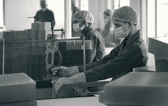 Workers making sugar soap by hand.