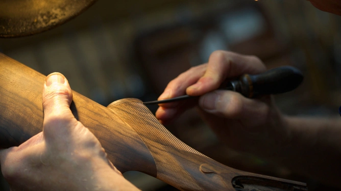 A gunstock being chequered at a Purdey facility. The process refers to forming small diamonds on parts used to hold a gun. 