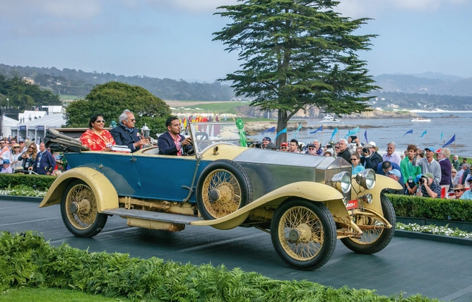 The 1921 Rolls-Royce Silver Ghost belonging to the Wankaner royal family, with the young Maharani of Wankaner and her father, the Maharaja of Sirohi seated inside, at the Pebble Beach Concours d’Elegance in California.