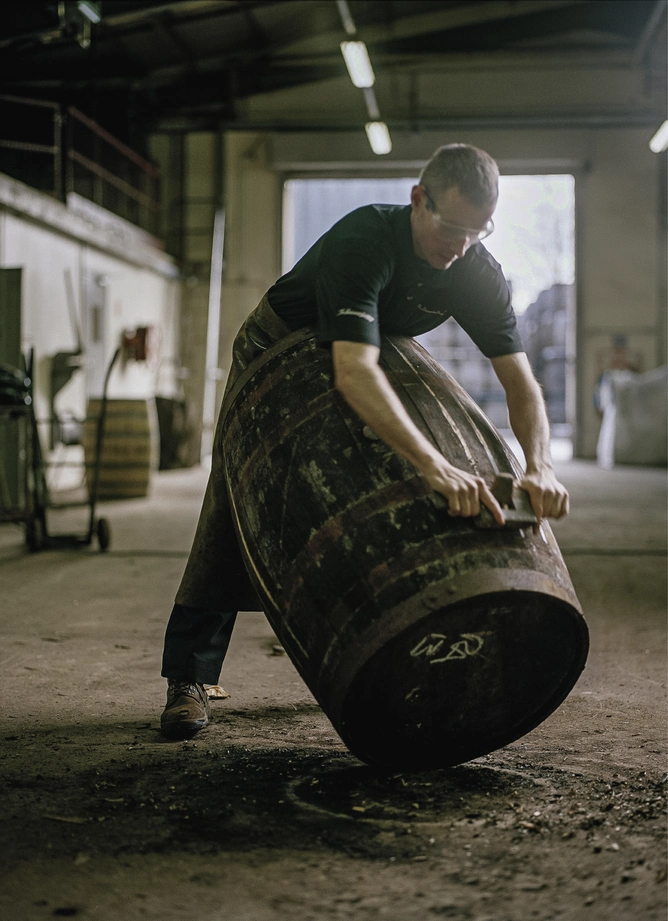 At The Balvenie’s cooperage, coopers work on the American oak and Spanish sherry casks where the whisky is matured.