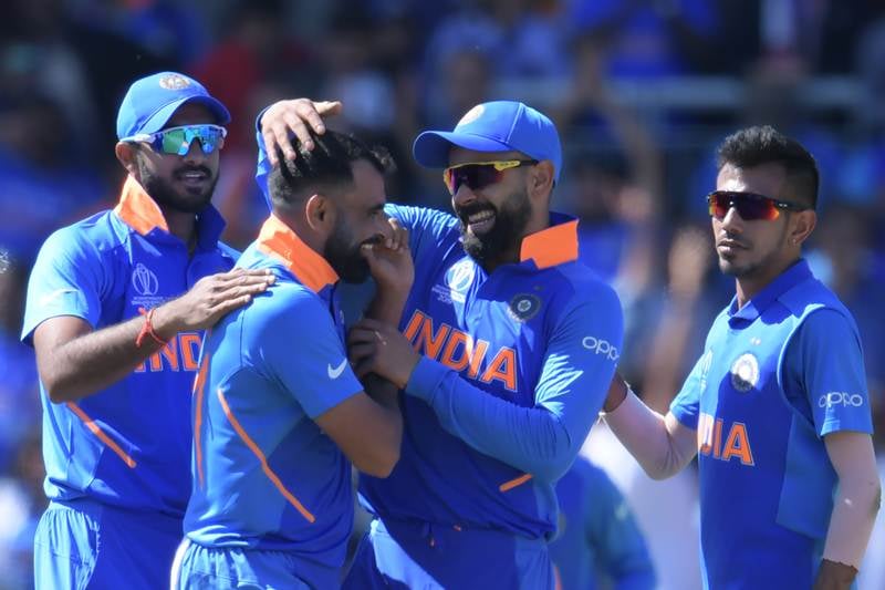 Team India celebrates a wicket against West Indies