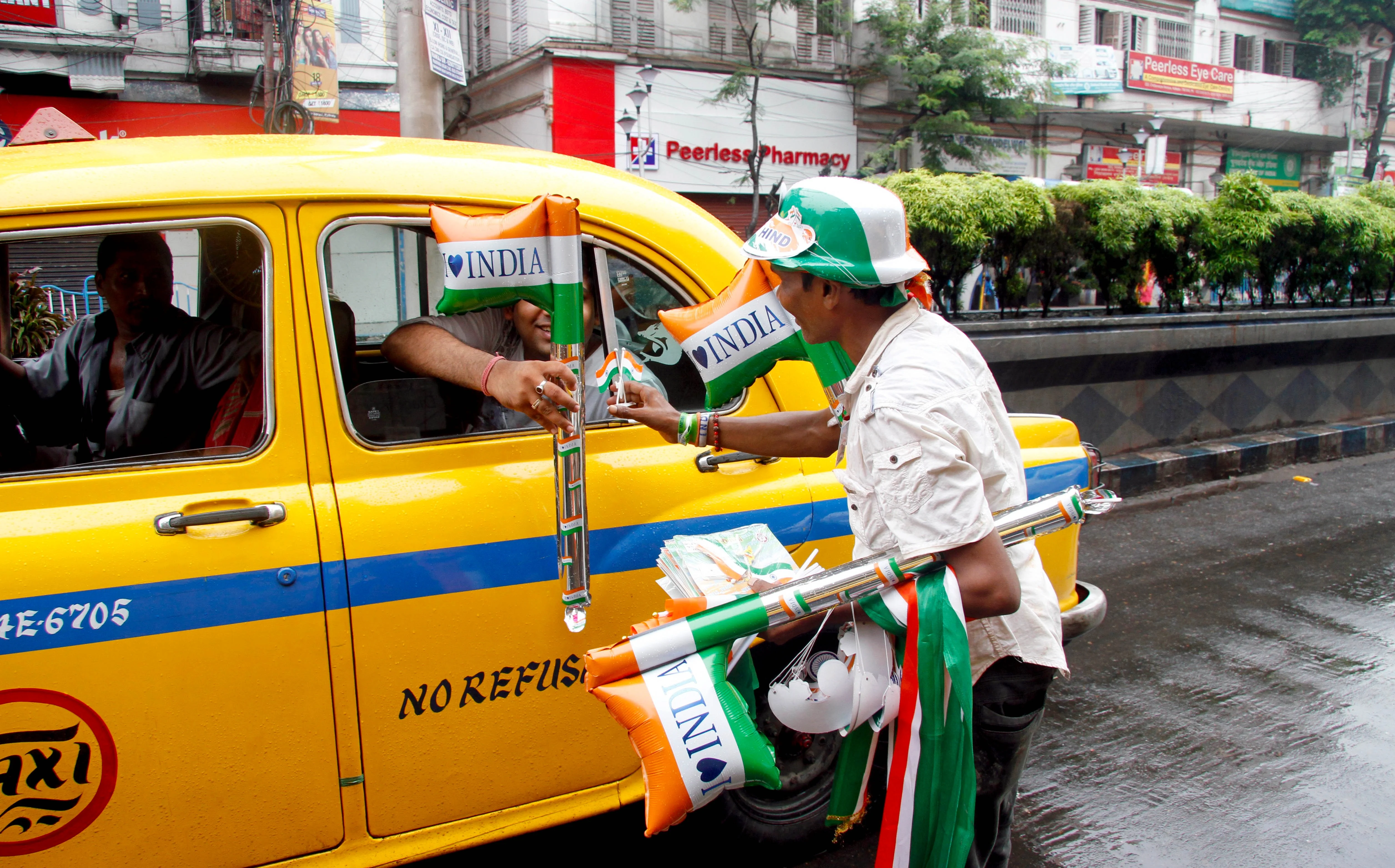 A man sells National flags on the occasion of 73rd Independence Day in Kolkata