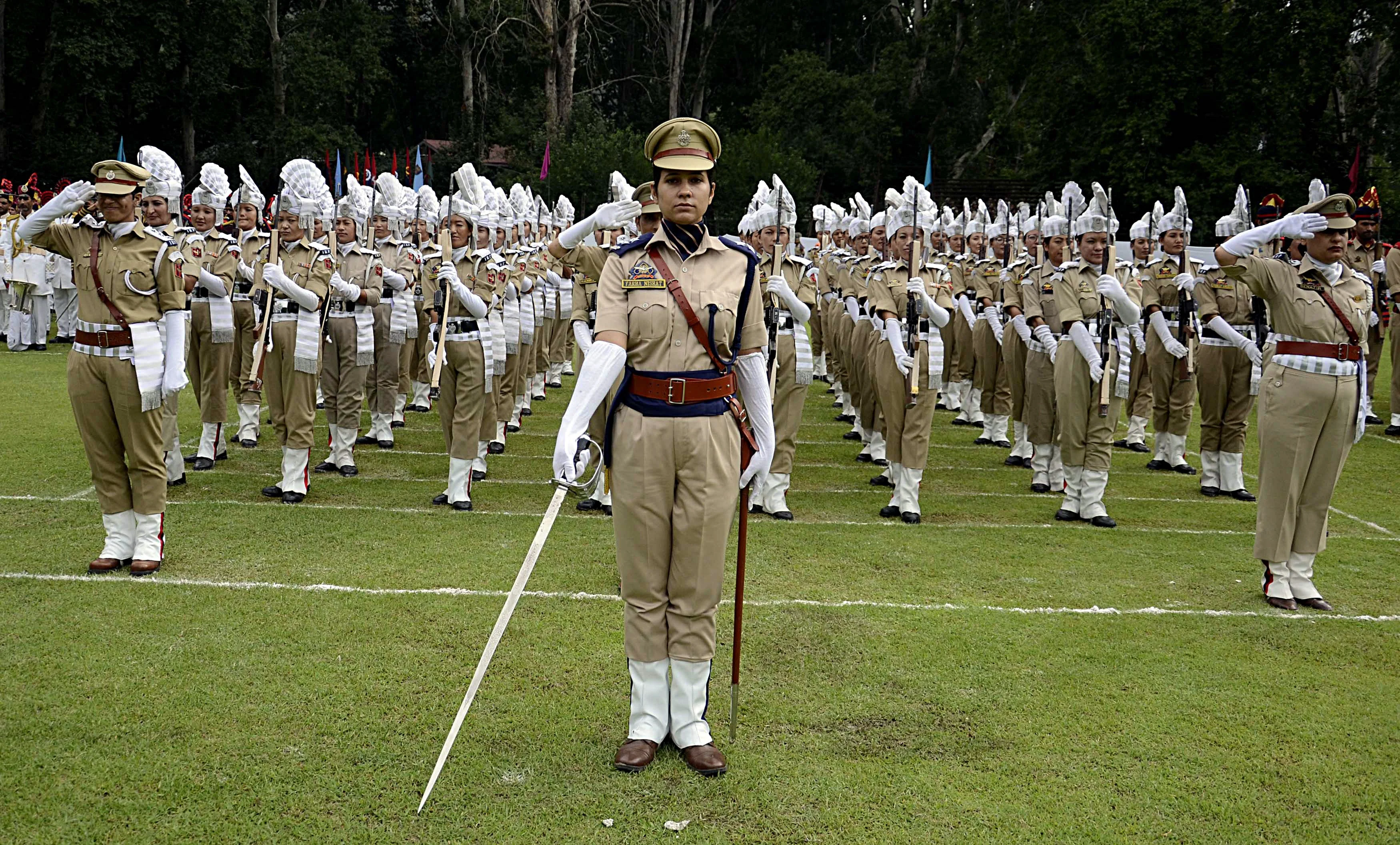 Female police contingent take part during the 73rd Independence Day celebration in Srinagar