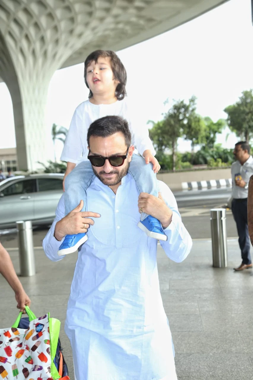 Taimur with Kareena Kapoor and Saif Ali Khan at airport