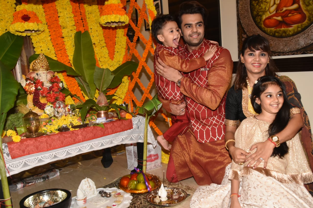 Actor Manish Paul was snapped at home with his wife and two kids during Ganesh Pooja.