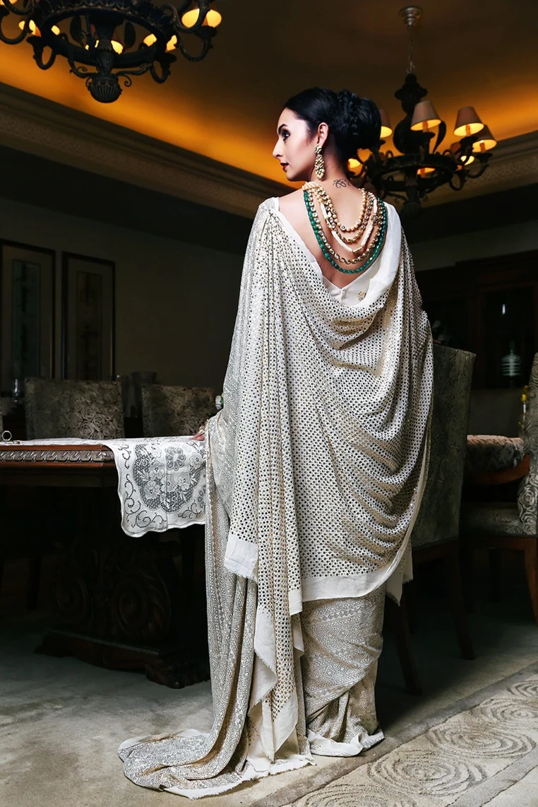 Luxury at needlepoint: From machine-made clothes, designers have now turned to traditional embroideries with a contemporary twist