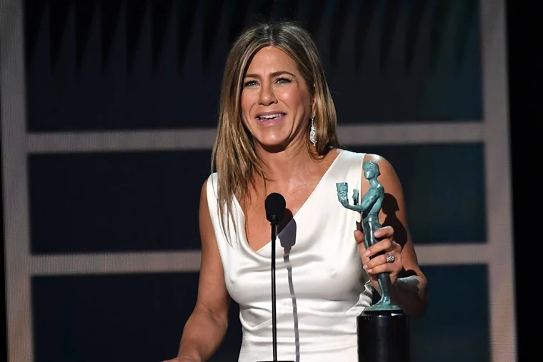 Brad Pitt drops everything backstage to watch Jennifer Aniston's speech at SAG Awards