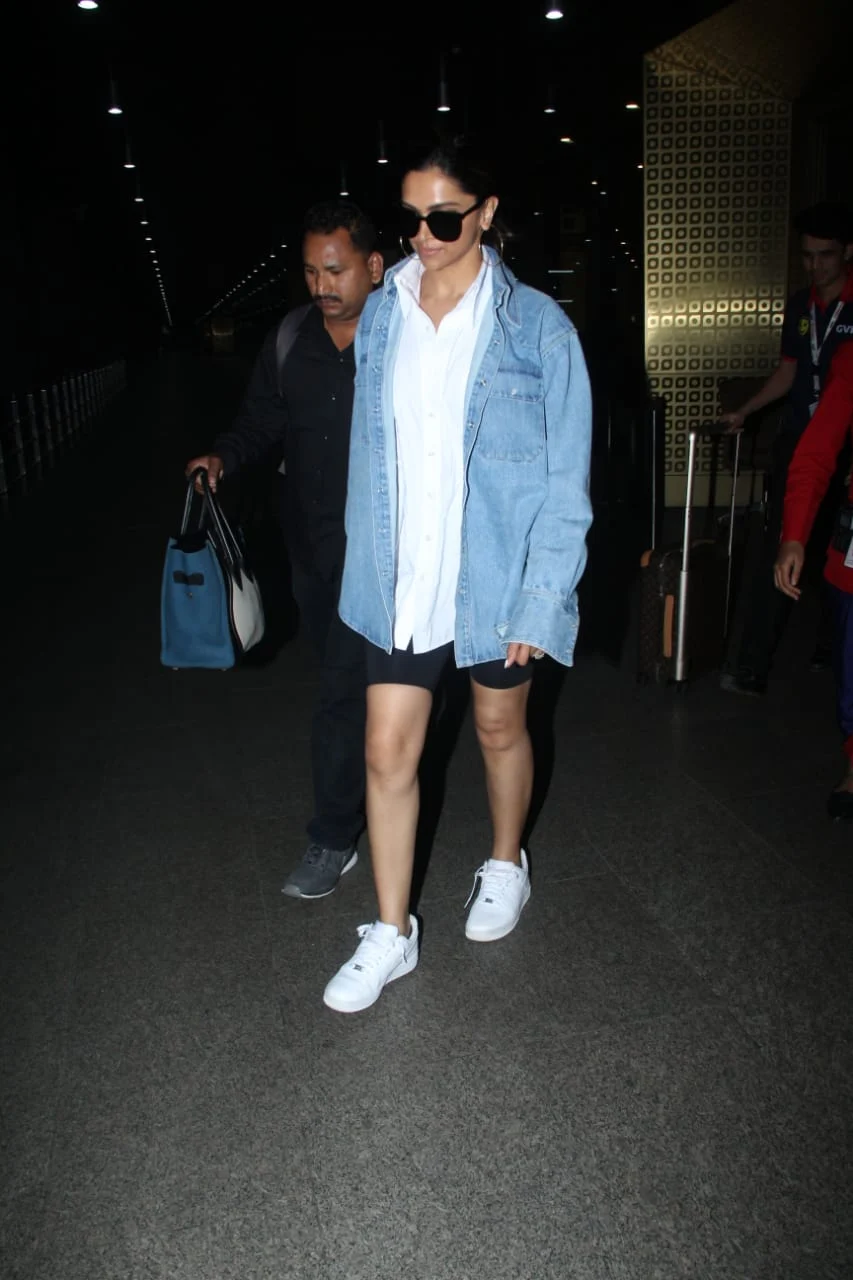 Deepika Padukone recycles her U2 concert outfit and Cannes denim jacket for a stunning airport look