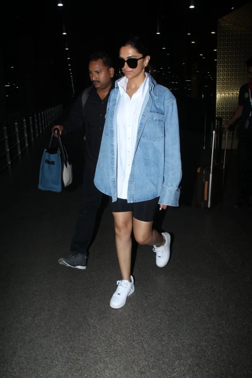 Deepika Padukone recycles her U2 concert outfit and Cannes denim jacket for a stunning airport look