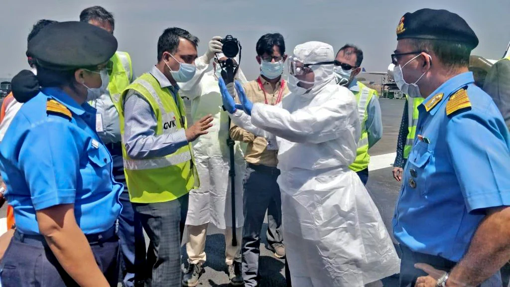 Medical officer screening all 44 Indian citizens who evacuated from Iran, as they shifted to the Indian navy quarantine facility set up camp at Ghatkopar in Mumbai