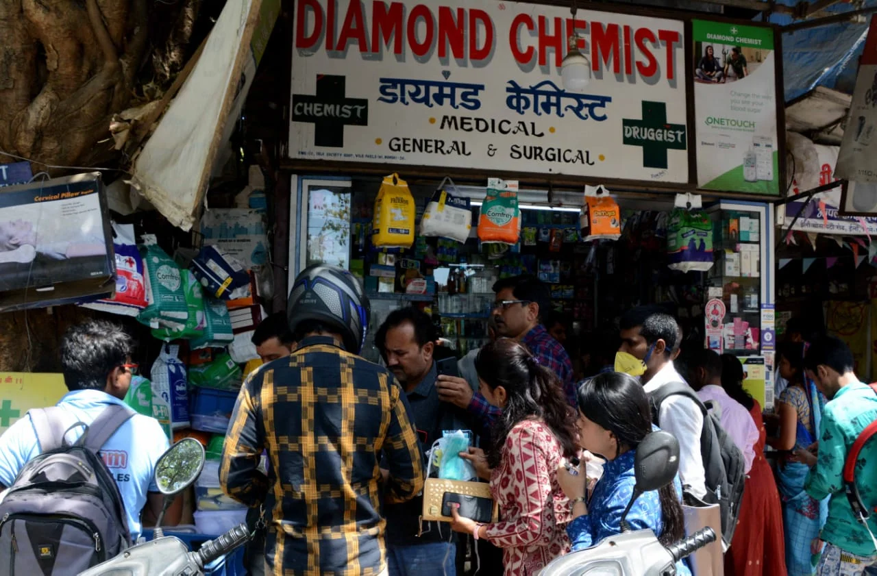 People flock to medical store to buy face masks and sanitizer