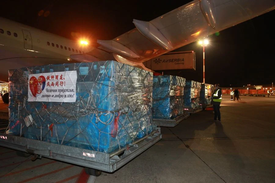 Medical supplies donated by the Chinese government are unloaded from an airplane in Belgrade, Serbia, March 21, 2020.