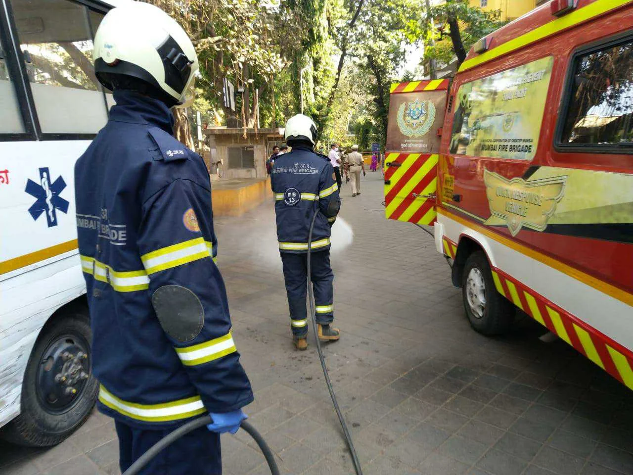 Mumbai Fire Brigade staffer disinfect the area near the hospital premises