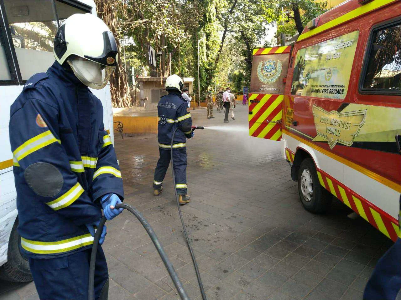 Mumbai Fire Brigade staffer disinfect the area near the hospital premises